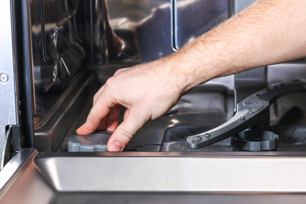 Step 1: Remove any visible debris from the dishwasher